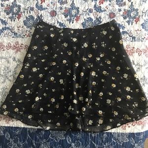 Black floral mini skirt
